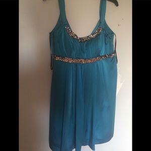 Satin blue dress with pewter stone trim